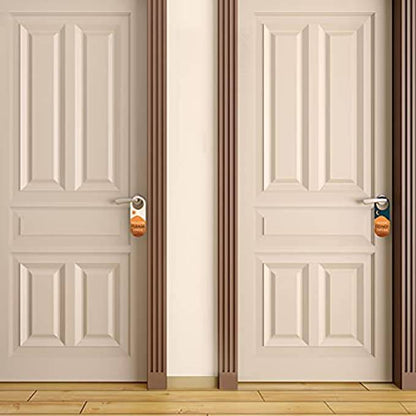 Two doors displaying ‘Please Knock’ and ‘Do Not Disturb’ double-sided door hangers, ideal for reducing interruptions in hotels, offices, and homes