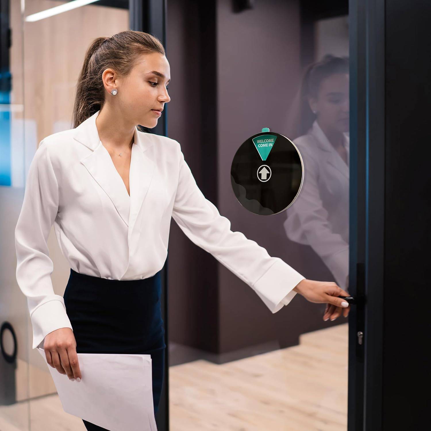 Do not disturb office sign in use on a glass door, displaying ‘Welcome Come In’ to communicate availability in a professional workspace.