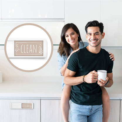 Couple in a kitchen with the Clean Dirty Dishwasher Magnet, 'Clean' side visible, emphasizing the product's practical and decorative use