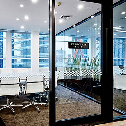 Employees only sign displayed on a glass office entry door - ensuring restricted access in modern business settings