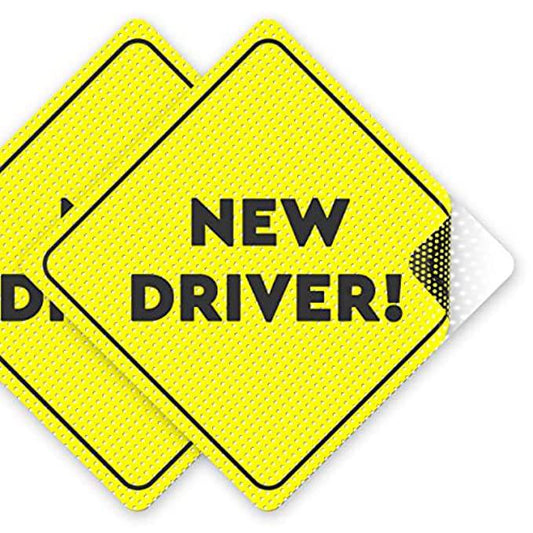 Two yellow diamond-shaped "New Driver" stickers with perforated design, ideal for student drivers to increase visibility and safety