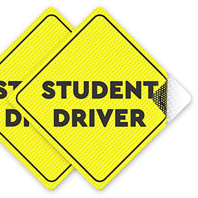 Two yellow reflective student driver stickers with black bold text 'Student Driver' designed for increased safety and awareness on the road. 