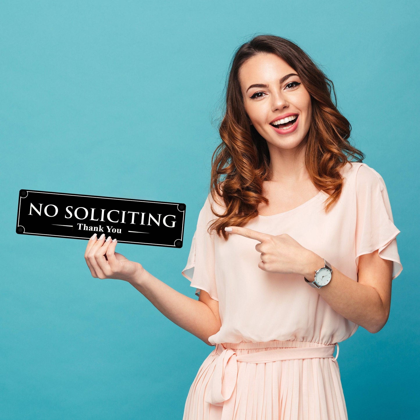 woman holding no soliciting sign, ideal for home or office to politely discourage solicitation 